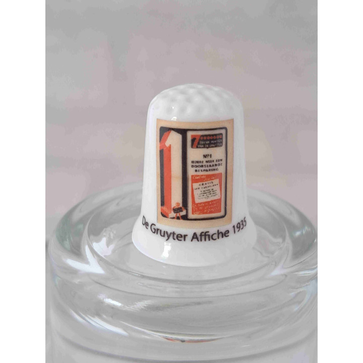 De Gruyter affiche 1935 reclame op een porselein vingerhoedje De Gruyter affiche 1935 reclame op een porselein vingerhoedje