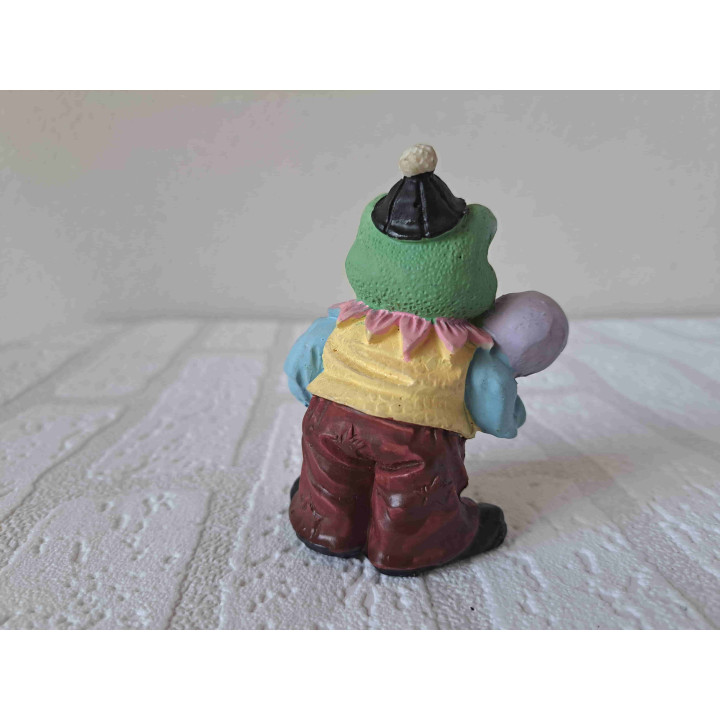 Kikker verkleed als clown met ballon
