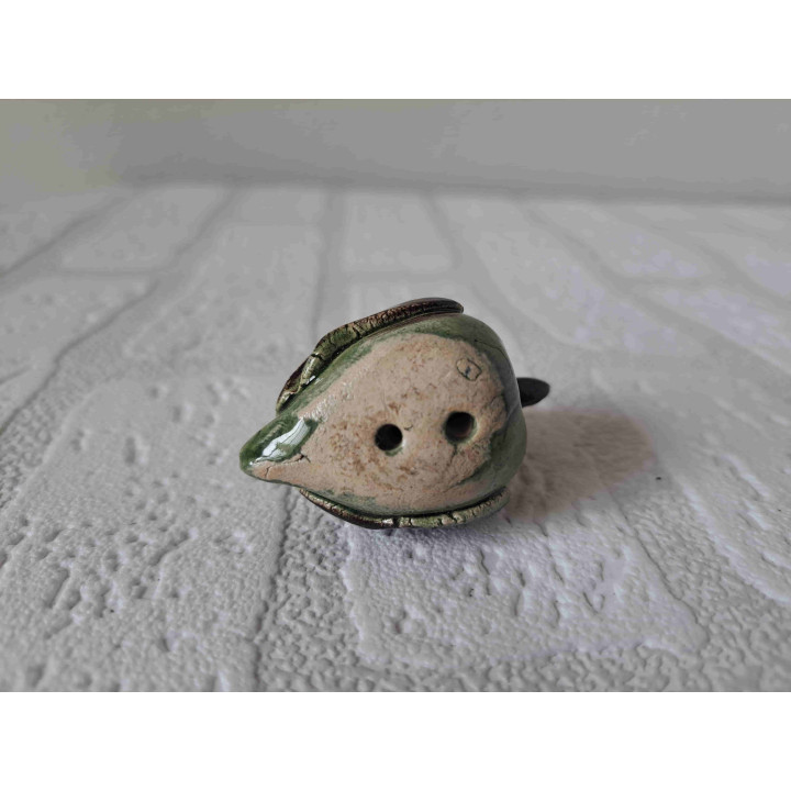 Eend gemaakt van gebakken klei