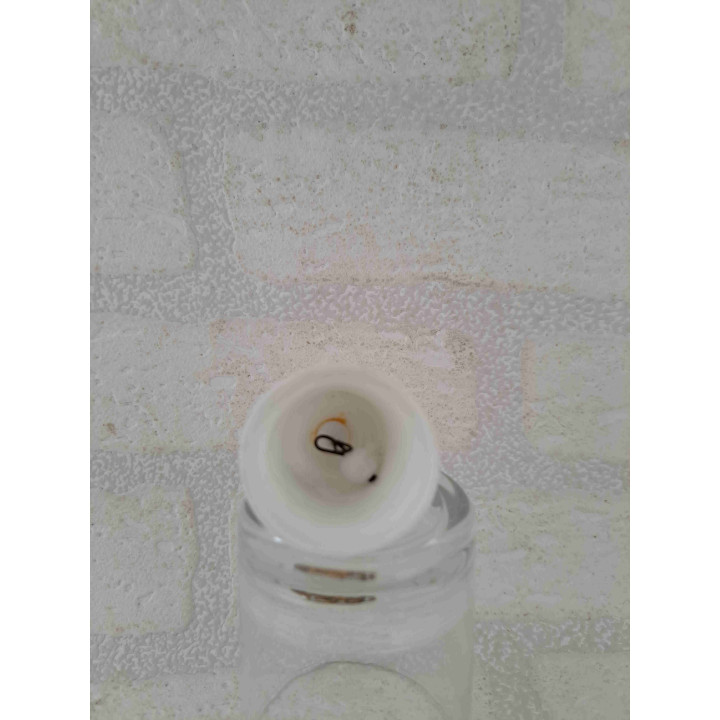 Porselein tafelbelletje met een goudkleurig leeuw sterrenbeeld opdruk