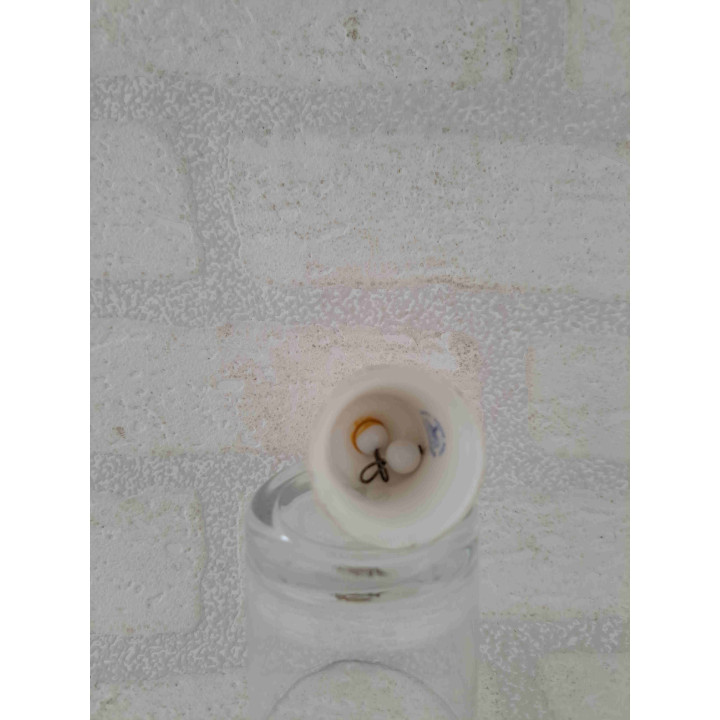 Porselein tafelbelletje met een goudkleurig schorpioen sterrenbeeld opdruk