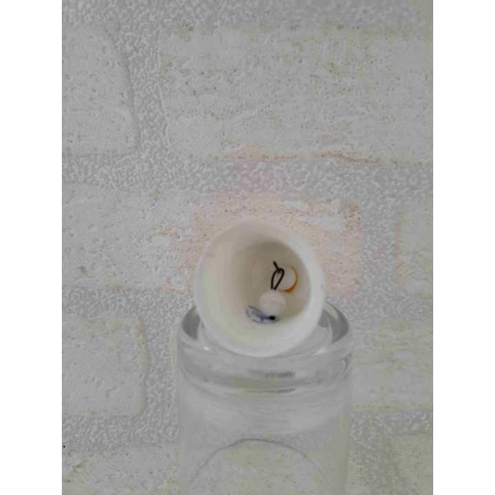 Porselein tafelbelletje met een goudkleurig stier sterrenbeeld opdruk