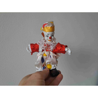Clown van porselein met bewegende armen en benen Clown van porselein met bewegende armen en benen