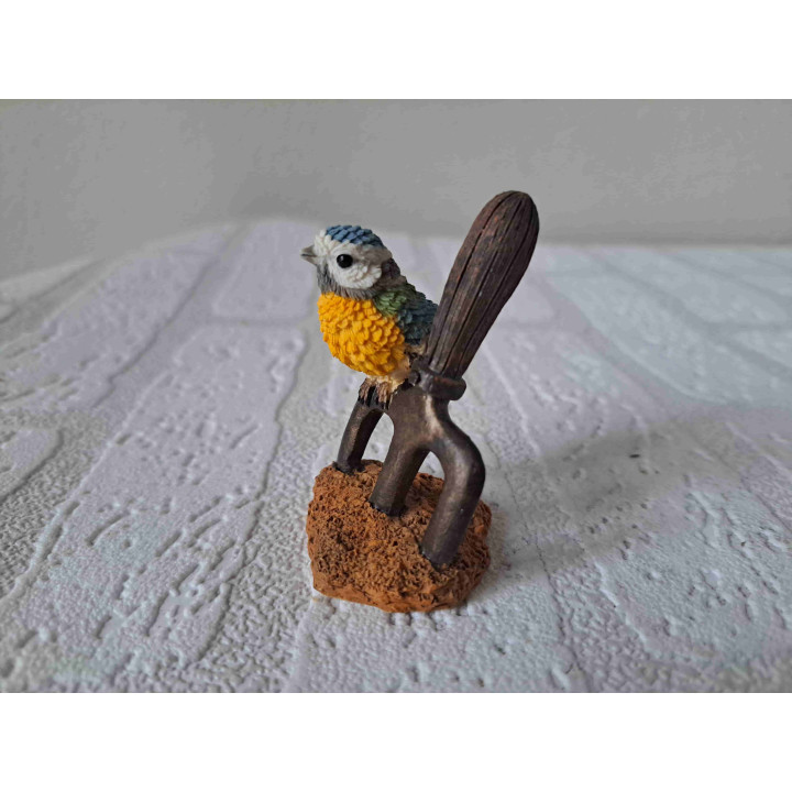 Pimpelmees op hooivork