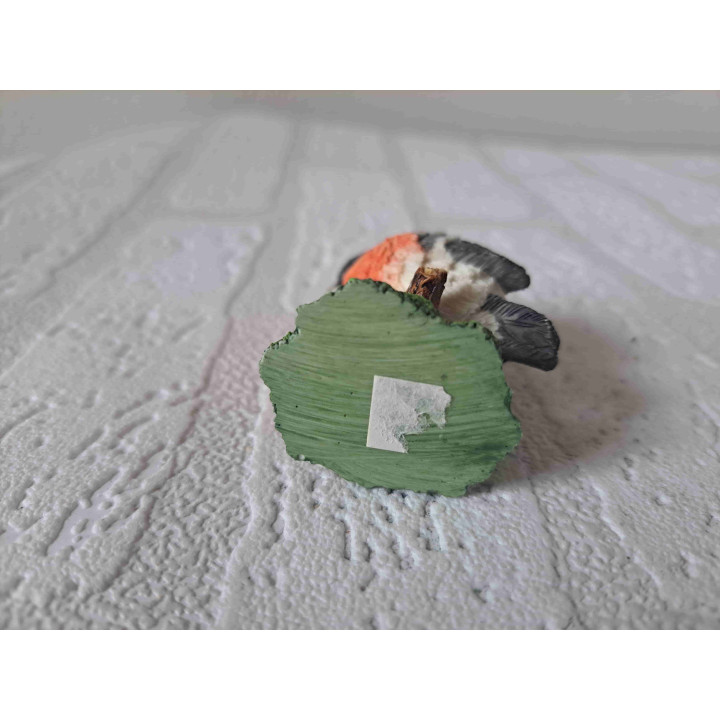 Goudvink vogel op een tak