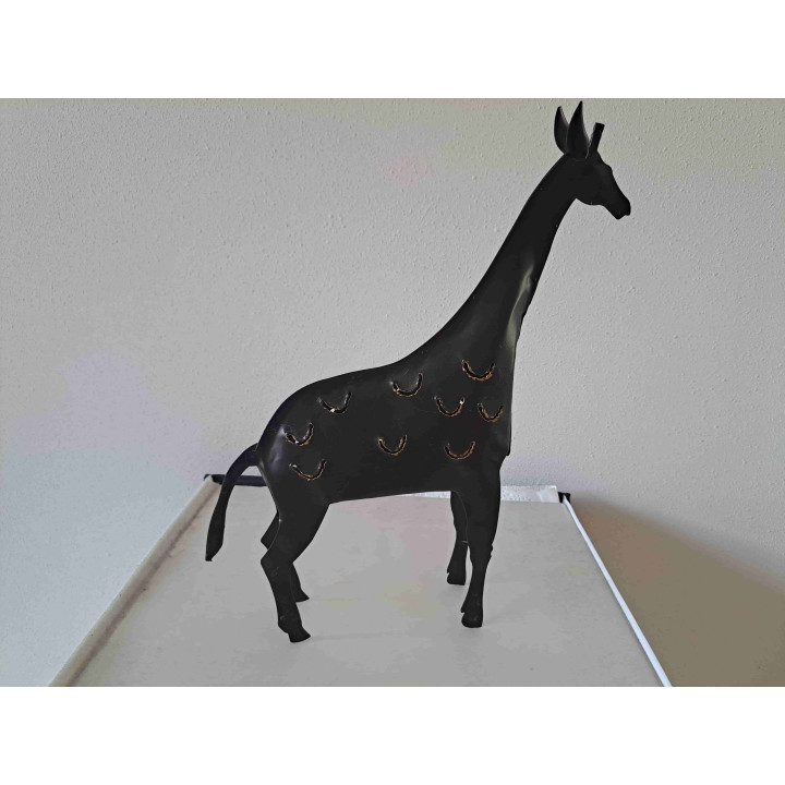 Giraffe van metaal met theelichtje