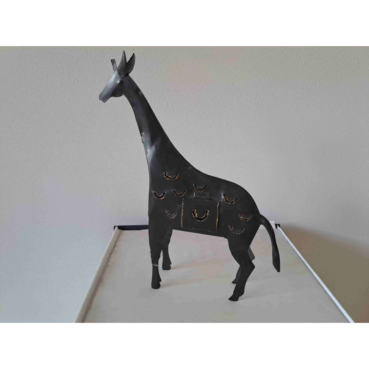Giraffe van metaal met theelichtje