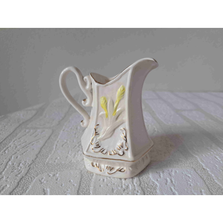 Melkkan van porselein met graan opdruk