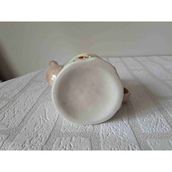 Theepot in een vorm van een ronde huis