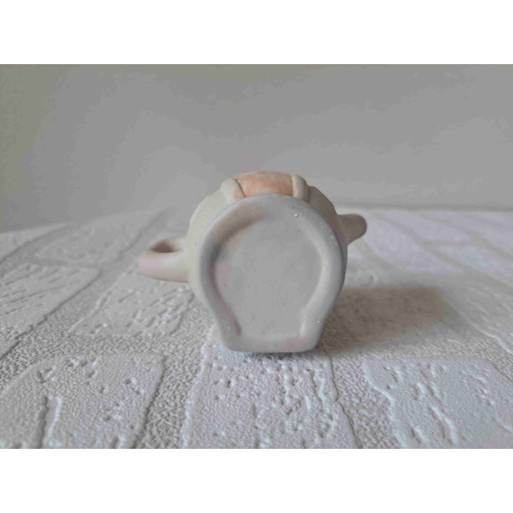 Theepotje in een vorm van een huisje