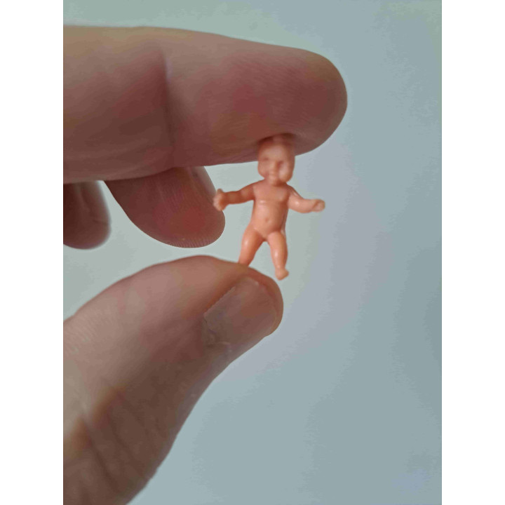 Baby wit poppetje 1:24 poppenhuis miniatuur