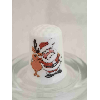 Kerstman met hert op een porselein vingerhoedje