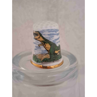 Tyrannosaurus dinosaurus vingerhoedje met goud randje Tyrannosaurus dinosaurus vingerhoedje met goud randje