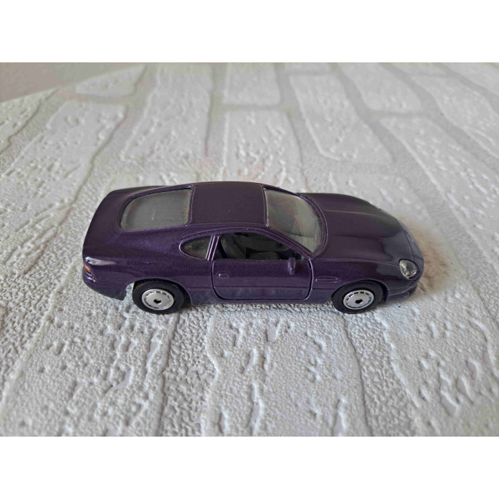 Aston Martin DB7 Maisto Shell 1:40 paars - modelauto