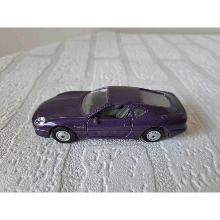 Aston Martin DB7 Maisto Shell 1:40 paars - modelauto
