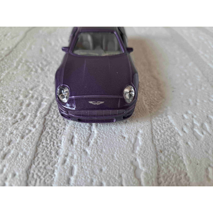 Aston Martin DB7 Maisto Shell 1:40 paars - modelauto