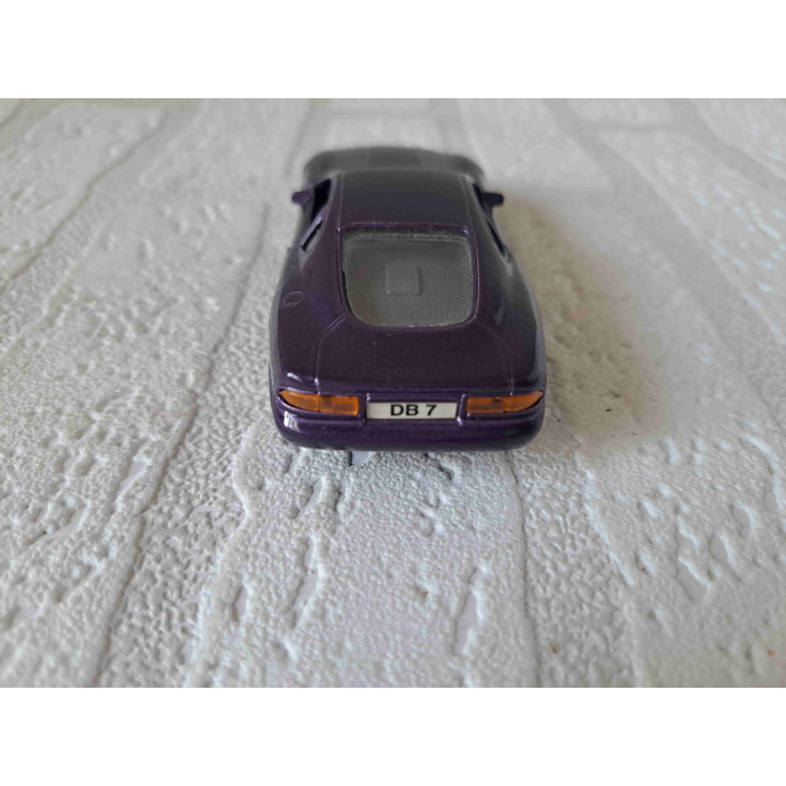 Aston Martin DB7 Maisto Shell 1:40 paars - modelauto