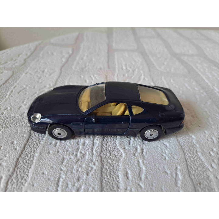 Aston Martin DB7 Maisto Shell 1:40 donkerblauw - modelauto
