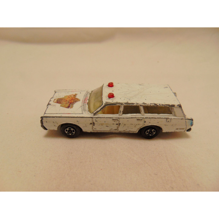 Mercury Commuter politie Matchbox 1:64 wit