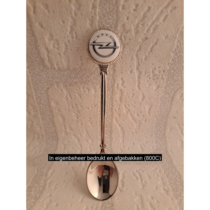 Metaal thee-koffie lepeltje Opel logo-embleem op het porselein rondje