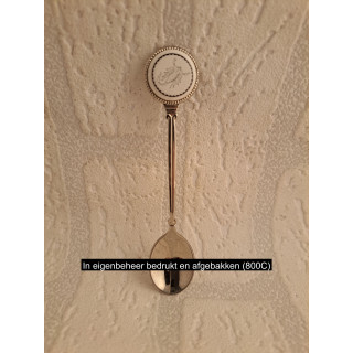 Metaal theelepeltje sterrenbeeld schorpioen op porselein rondje