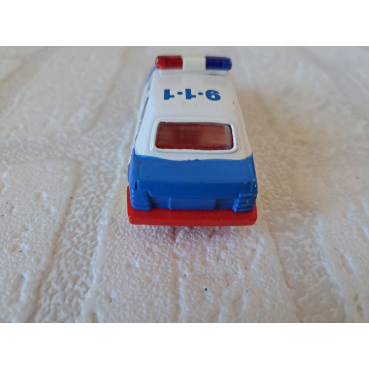 Ford Escort 1.6i Police 1:64 Maisto - modelauto