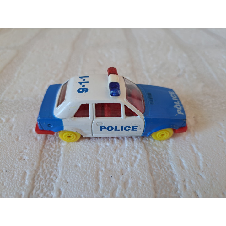 Ford Escort 1.6i Police 1:64 Maisto - modelauto