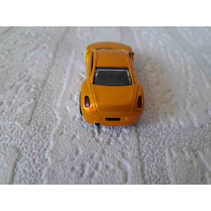 Teamsterz HTI TM-1B 6.5x3x2cm donkergoud - modelauto