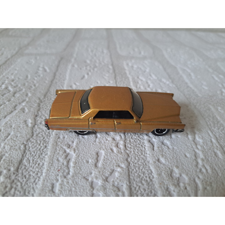Cadillac Sedan DeVille 1969 1:75 Matchbox MB739 goudkleurig - modelauto
