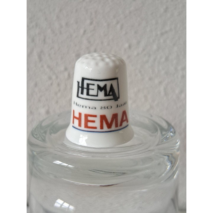 Logos Hema 80 jaar vingerhoedje