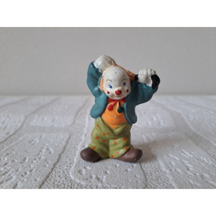 Clown van porselein verstopt zijn paraplu 4x3.5x6.5cm - beeldjes