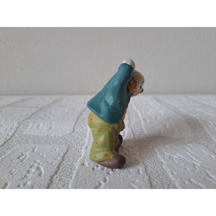 Clown van porselein verstopt zijn paraplu 4x3.5x6.5cm - beeldjes