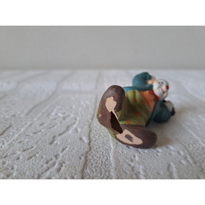 Clown van porselein verstopt zijn paraplu 4x3.5x6.5cm - beeldjes