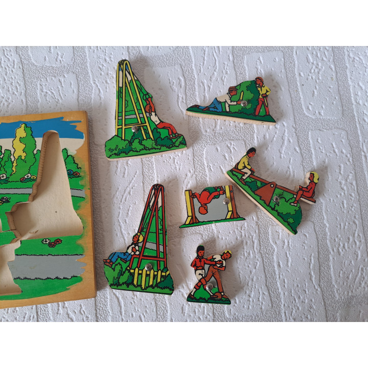 Houten dopjes puzzel met buiten taferelen 25x17.5x1cm - puzzels