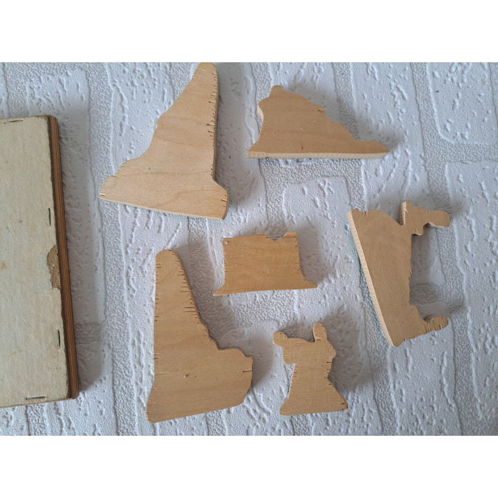 Houten dopjes puzzel met buiten taferelen 25x17.5x1cm - puzzels