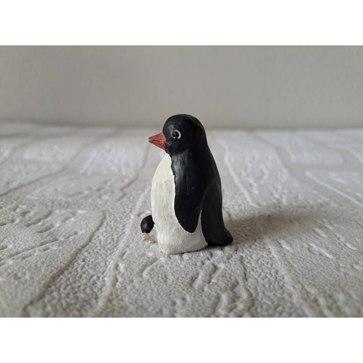 Pinguïn van kunsthars met jong 2.5x3x4.5cm - dierfiguren