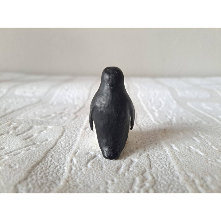 Pinguïn van kunsthars met jong 2.5x3x4.5cm - dierfiguren