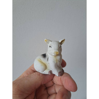 Zittend varken van porselein 5.5x3.5x5.5cm