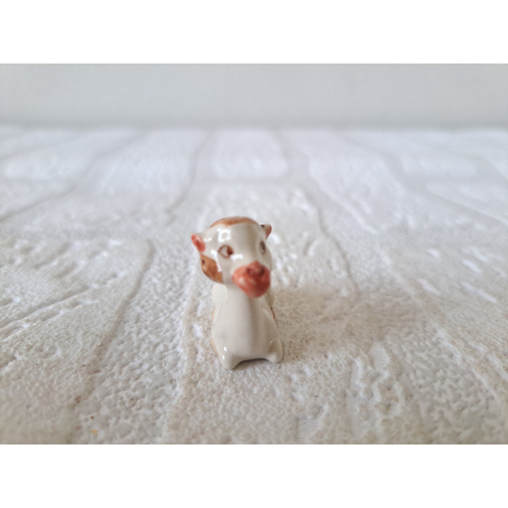 Zittend dromedaris van porselein 3x1x2.5cm - dierfiguren