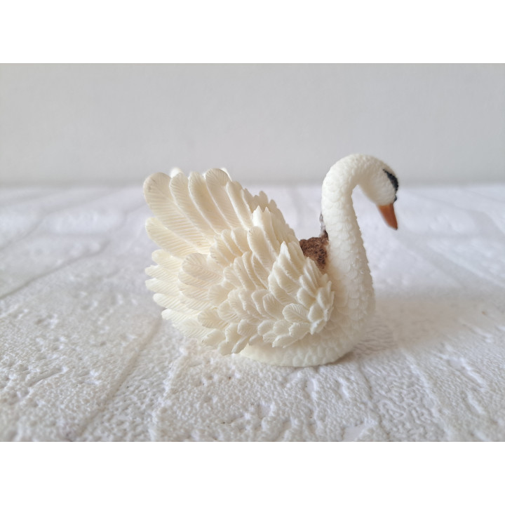 Zwaan van kunsthars met pul-jong 6x3.5x5cm (A1) - dierfiguren
