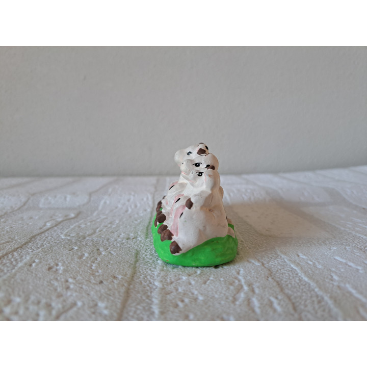 Varkens van keramiek op een rij 11.5x4.5x5cm - dierfiguren