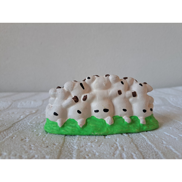 Varkens van keramiek op een rij 11.5x4.5x5cm - dierfiguren