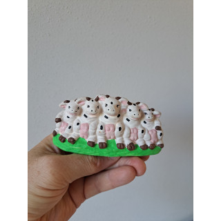 Varkens van keramiek op een rij 11.5x4.5x5cm