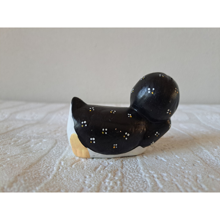 Liggende pinguïn van keramiek 8x4x6cm - dierfiguren