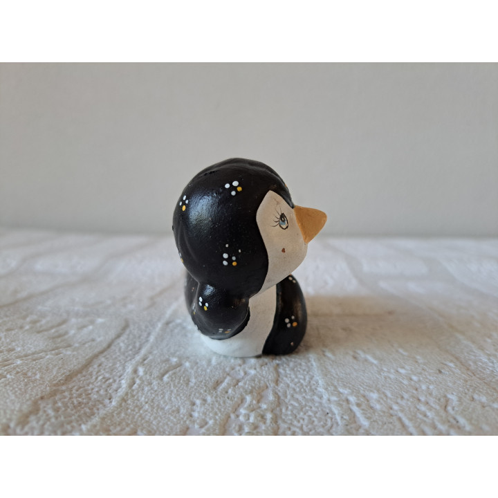 Liggende pinguïn van keramiek 8x4x6cm - dierfiguren
