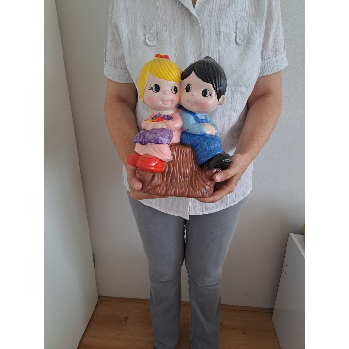 Meisje en jongen van keramiek Grote spaarpot 23x15.5x30cm