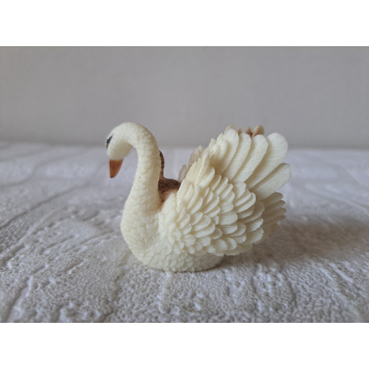 Zwaan van kunsthars met pul-jong 6x3.5x5cm (A2) - dierfiguren