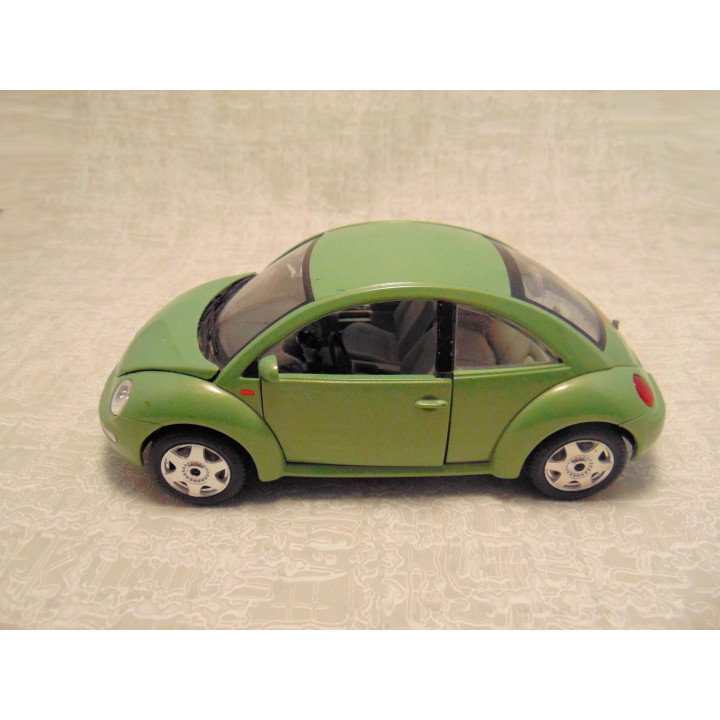 Volkswagen kever new beetle 1998 Bburago 1:24 groen