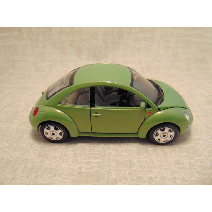 Volkswagen kever new beetle 1998 Bburago 1:24 groen