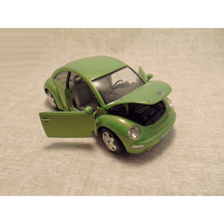 Volkswagen kever new beetle 1998 Bburago 1:24 groen